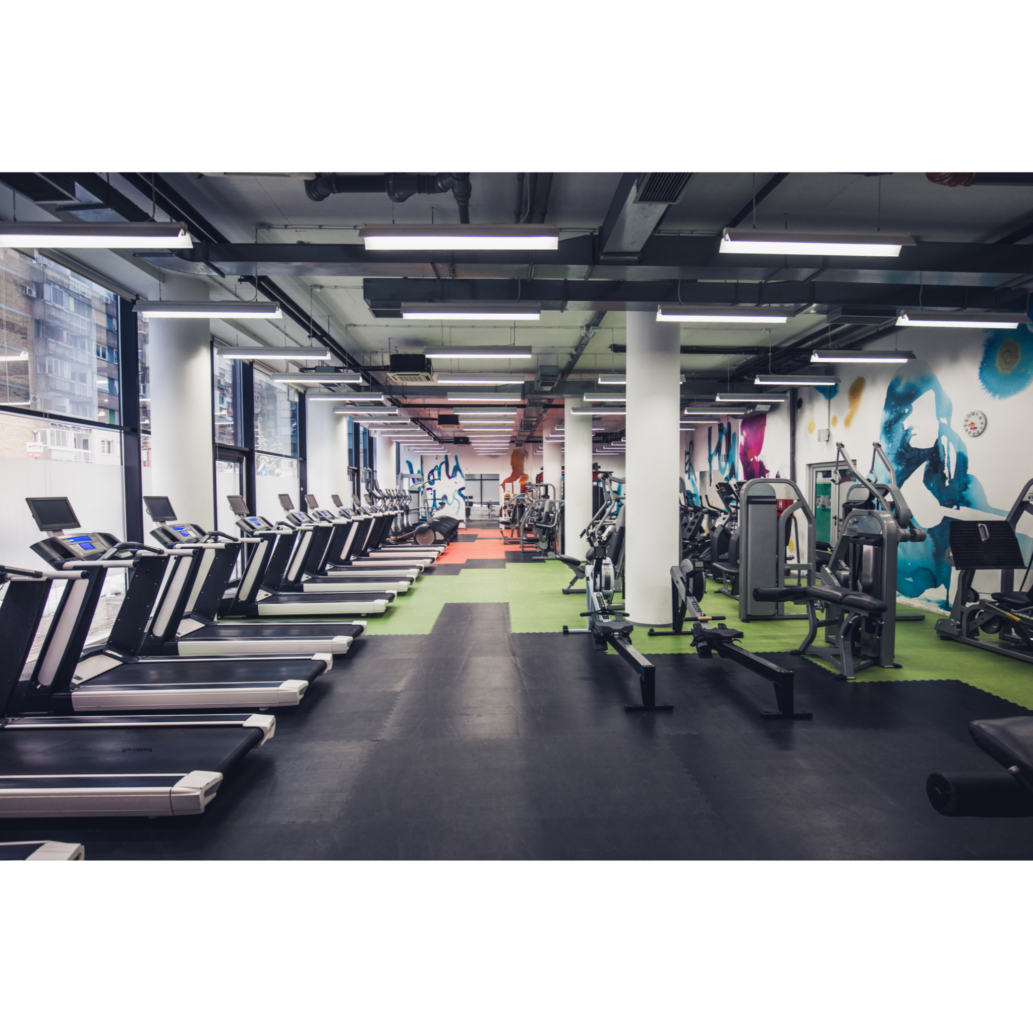 interior of a gym with various workout equipment cleaning gym and workout equipment